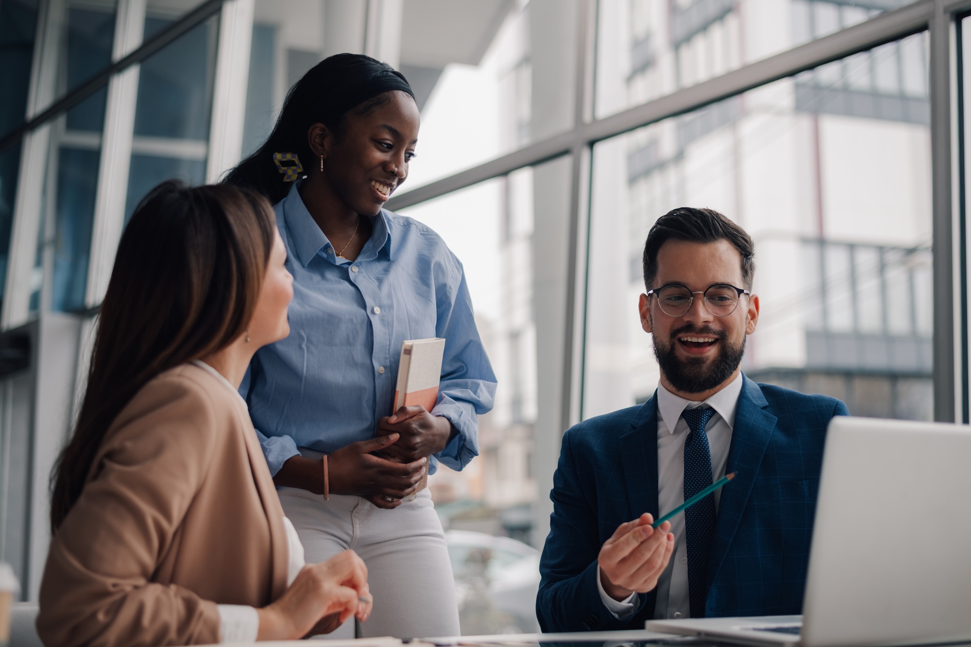 Business team discussing strategy during meeting in office