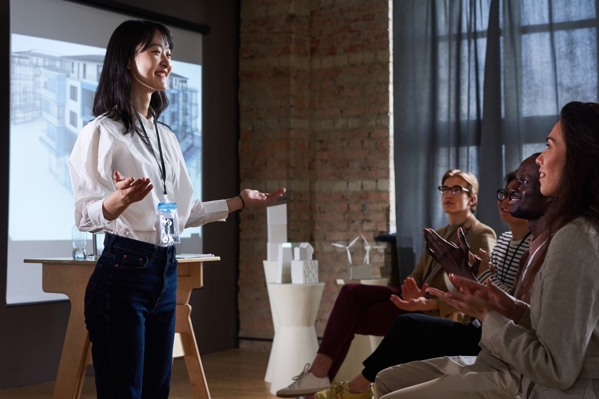 Woman presenting project at conference